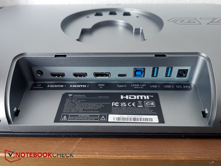 从左至右耳机、2 个 HDMI、DP、USB-C、USB-B Up、2 个 USB-A、电源